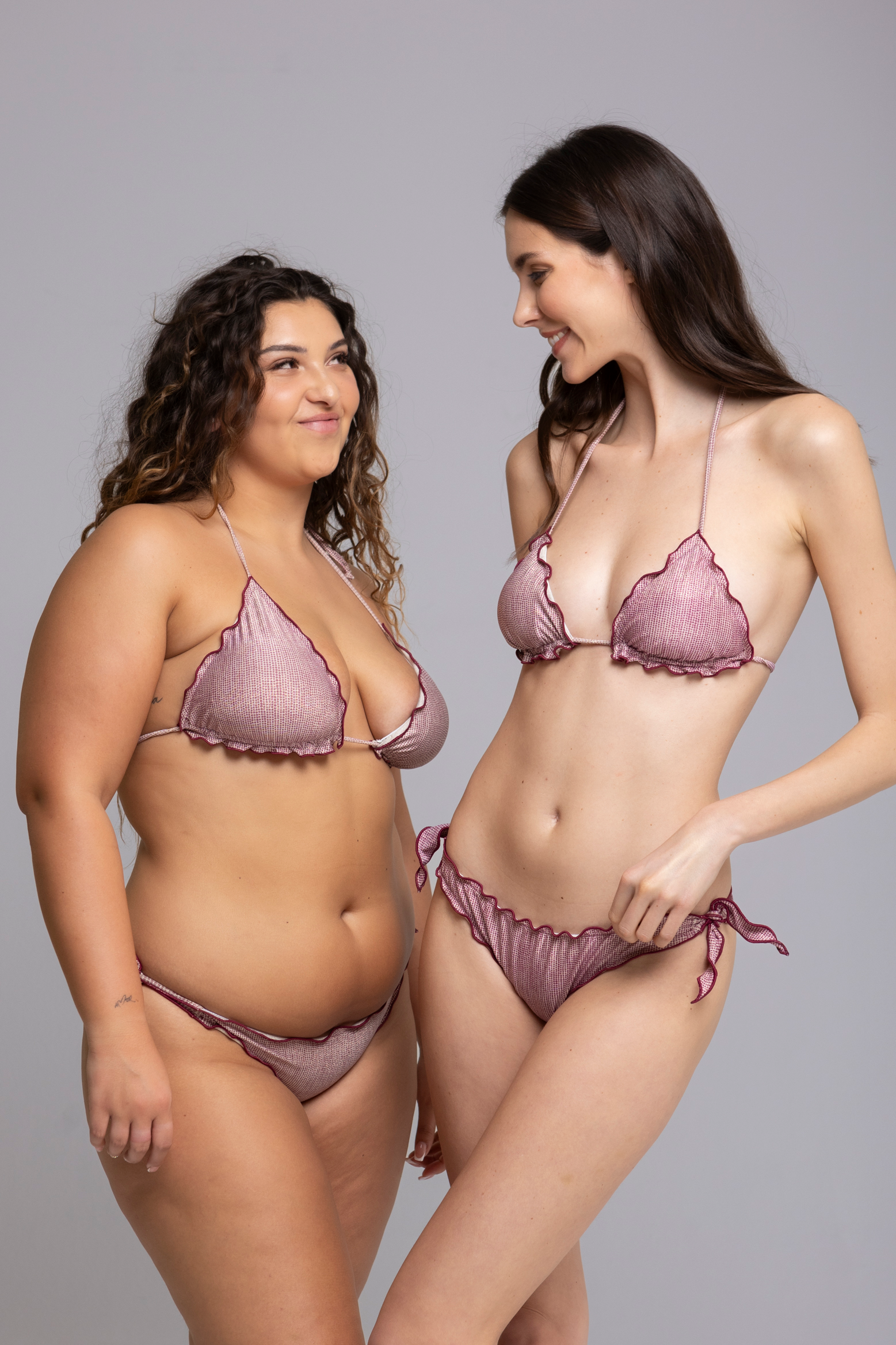 Models are wearing Fru Fru Lurex Pois Burgundy Bikini Set- front view - one in size small, one in size large