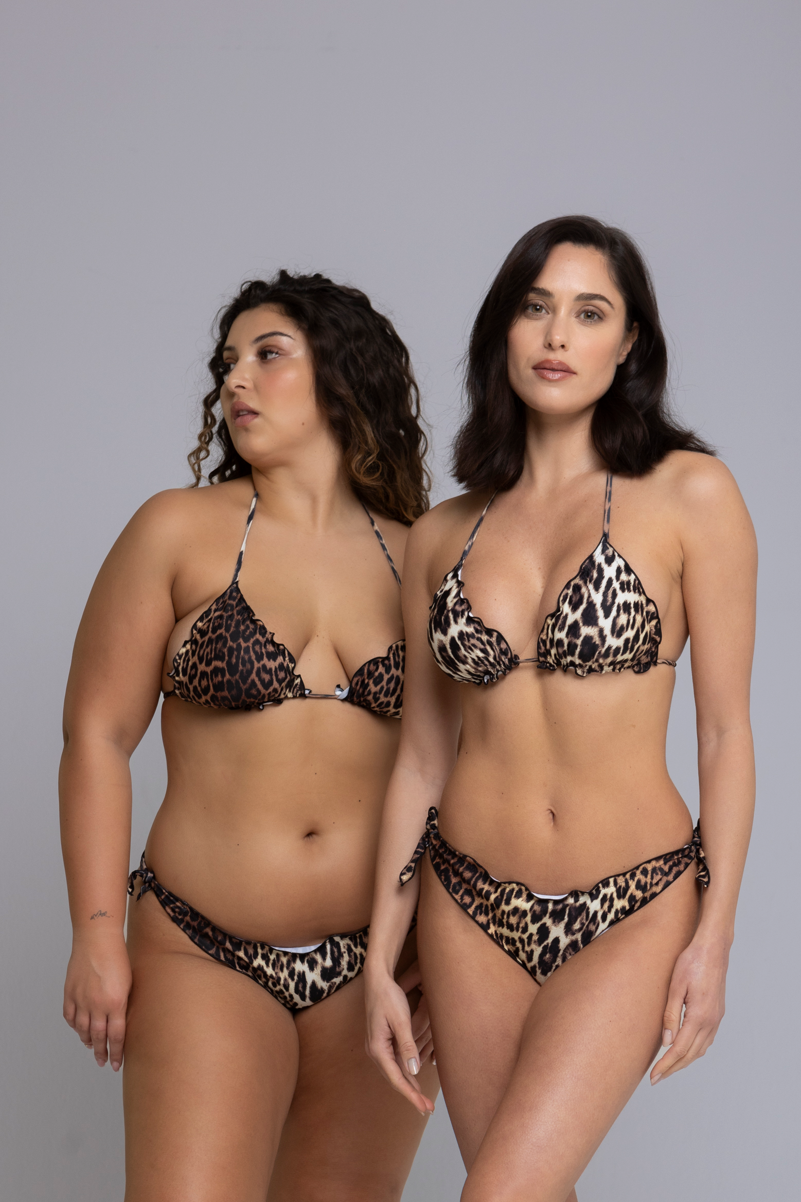 Two Models are wearing Fru Fru Leopard Print Triangle Bikini Set - front view - one in size small, one in size large