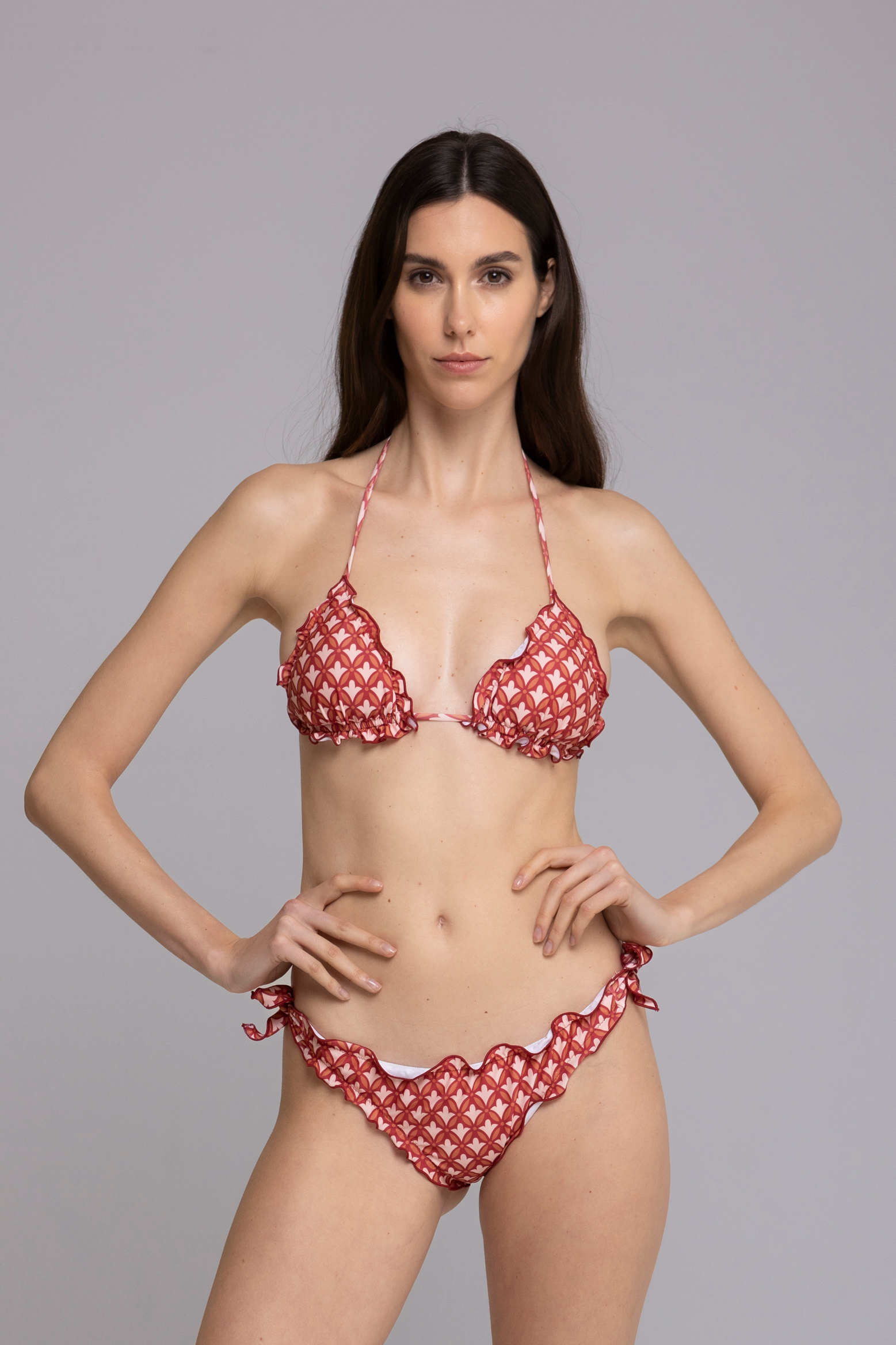 Model wearing Fru Fru Terracotta Fantasy Triangle Bikini Set - front view
